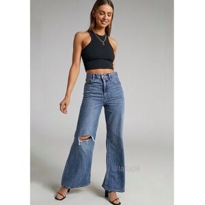 Levi’s Distressed Super High Rise Flare 27 x 32​